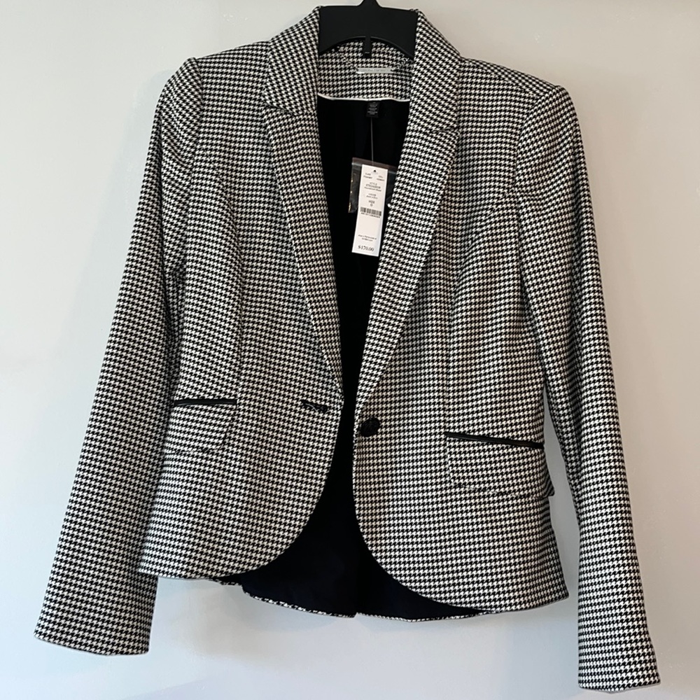 White and black blazer
